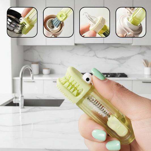 Hand holding a green cleaning tool with various components on a gray background