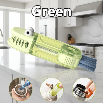 Green brush with googly eyes on a white background