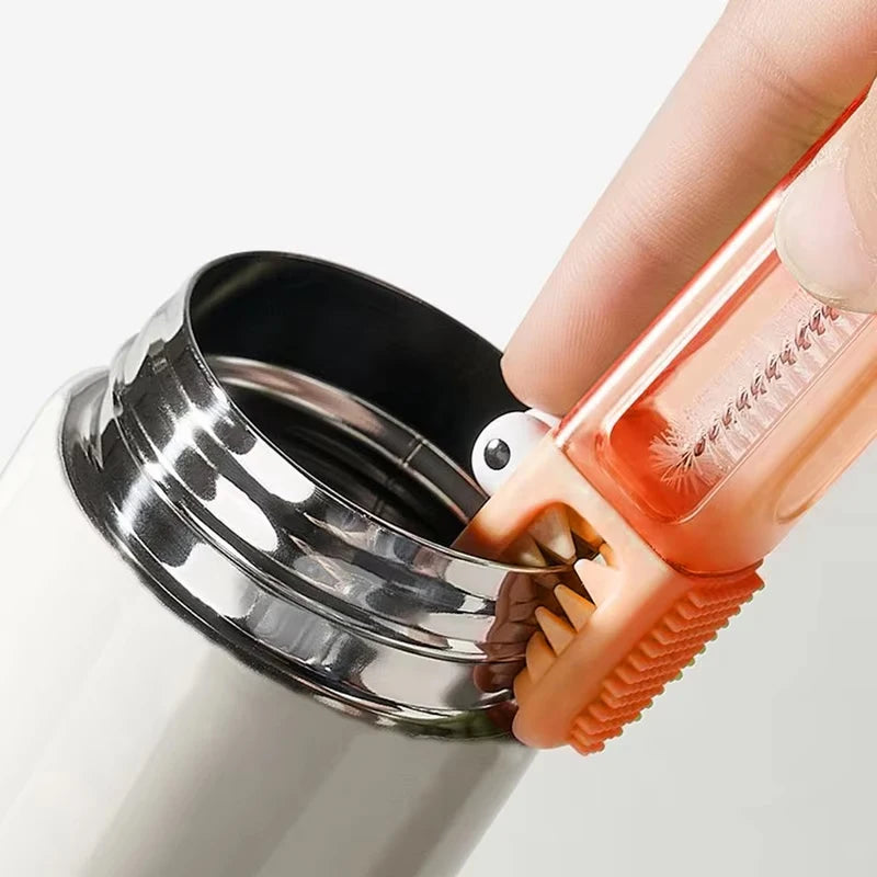 Hand using a tool to open a metal lid on a container.